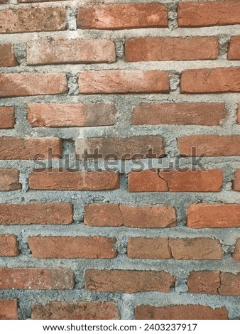 Photo of a neatly arranged brick wall