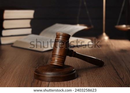 Law concept. Judge's gavel on wooden table