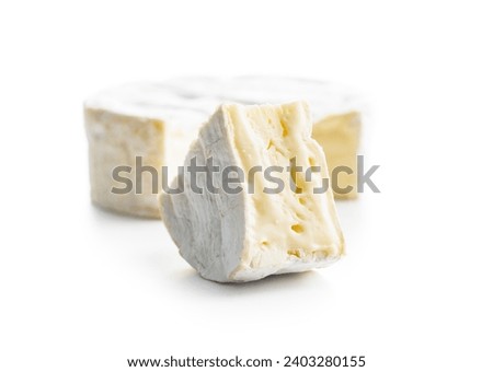 Brie type cheese with white mold. French camembert cheese isolated on the white background. Royalty-Free Stock Photo #2403280155