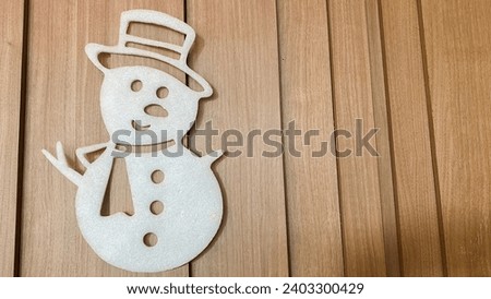 Christmas interior with snowman on cafe wooden wall