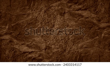  Dark orange rust brown stone texture background. Rough rock mountain surface. Nature. Close-up. Vein cracks. Empty space. Design.
