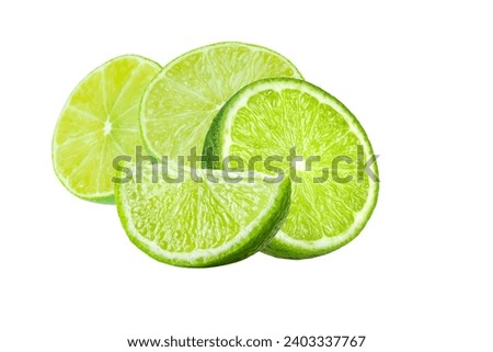 Delicious lime slices close up on white stock photo