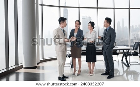 Business people in the office discuss work
