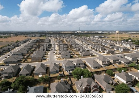 Drone footage of a suburban area in Kyle, TX Royalty-Free Stock Photo #2403366363