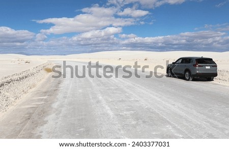 On the gypsum Dunes Drive Road at White Sands National Park. Royalty-Free Stock Photo #2403377031