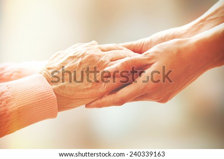 Helping hands, care for the elderly concept Royalty-Free Stock Photo #240339163