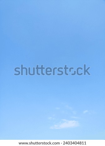 Transparent sky background image with space to add your text with beautiful little clouds.Vertical photos for creating content on your social media.