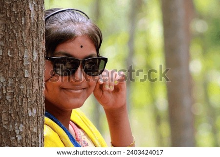 Beautiful Young Indian Girl Where sunglasses.