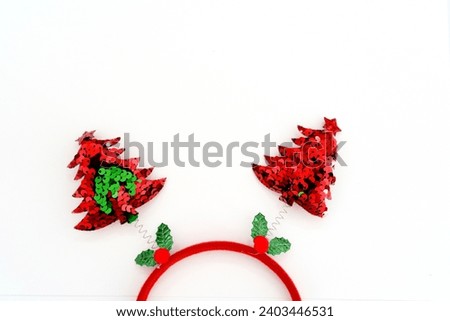 Beautiful headband funny christmas trees isolate on a white backdrop. concept of joyful Christmas party,New year is coming soon, festive season decoration with Christmas elements