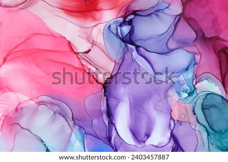 Currents of translucent hues, snaking metallic swirls, and foamy sprays of color shape the landscape of these free-flowing textures. Natural luxury abstract fluid art painting in liquid ink technique Royalty-Free Stock Photo #2403457887