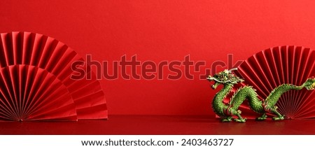 Happy Chinese New Year 2024 banner template. Traditional festival paper fans with dragon on red background.