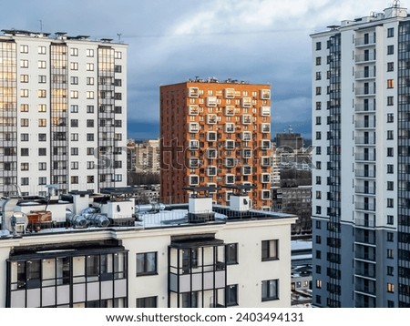 Saint Petersburg, September 27, 2023.  Multi-storey modern residential building before thunderstorm