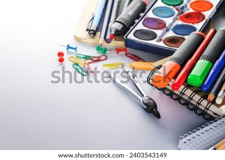 A image of various colorful supplies school