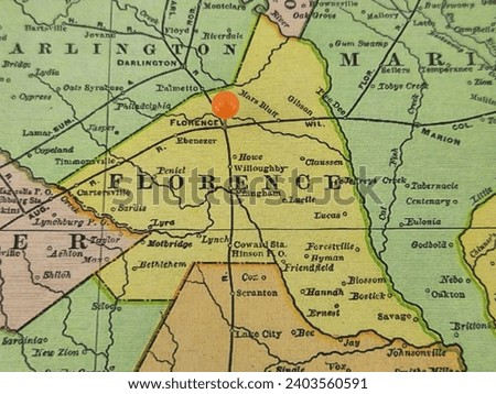 Florence County, South Carolina marked by an orange tack on a colorful vintage map. The county seat is located in the city of Florence, SC.