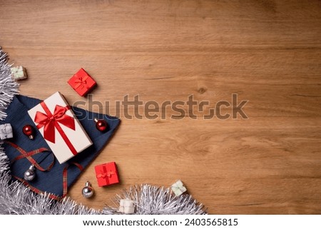 Beautiful New Year and Christmas gift boxes and decorations. The concept of the celebration of winter holidays. Flat lay, top view, copy space.