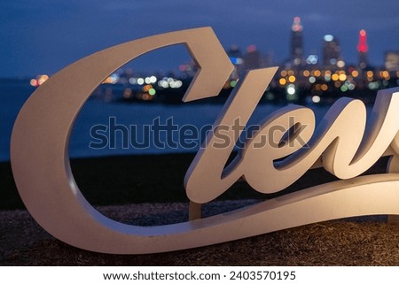 Closeup of Cleveland Sign with City in Background