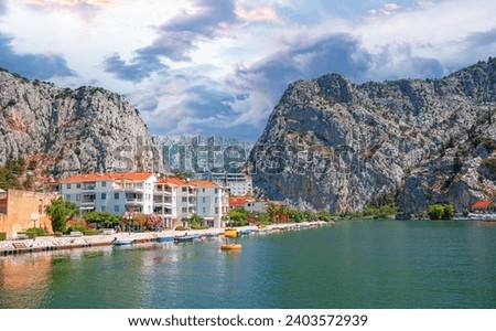 Omis Croatia. Picturesque town in Dalmatia where Cetina River meets the Adriatic Sea. Royalty-Free Stock Photo #2403572939