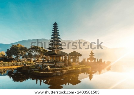 Ulun Danu Beratan Temple in Bali - Bali's Iconic Lake Temple, is both a famous picturesque landmark and a significant temple Royalty-Free Stock Photo #2403581503