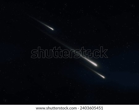Shooting stars in the night sky. Beautiful meteorites on a black background. Three falling meteors.