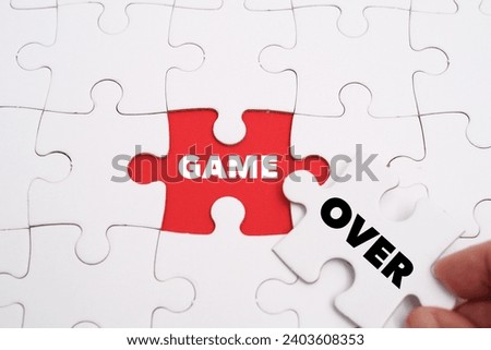 Game Over word alphabet letters on puzzle as a background