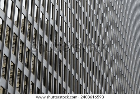 Rows of windows on a modern high rise office building. Abstract architectural background.