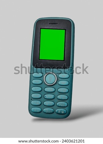 a picture of keypad phone in the white background
