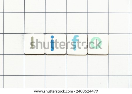 Colorful tile letter in word LIFO (abbreviation of last in first out) on white grid background