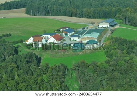 Aerial view of Vilshofen countryside. Panoramic aerial view on Wenninger wood chips production. Renewable resources to generate energy. Hofkirchen, Germany