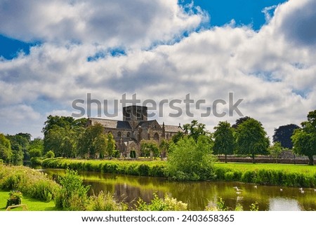 St Mary's Parish Church and the River Tyne, Haddington, Mid Lothian, Scotland Royalty-Free Stock Photo #2403658365