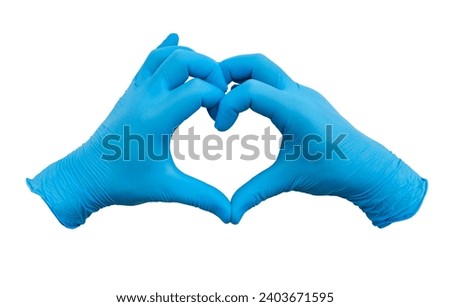 Hands in blue rubber gloves show a heart on a white background. Rubber gloves isolate