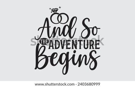 And So The Adventure Begins - Wedding Ring T-Shirts Design, Hand drawn lettering phrase, Handmade calligraphy vector illustration, Hand written vector sign, EPS. Royalty-Free Stock Photo #2403680999