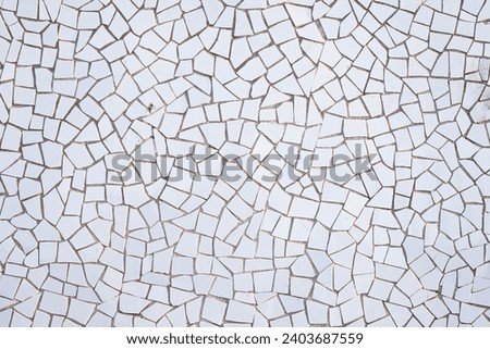 Bright blue puzzle background. Geometric shapes pattern. Mosaic pieces background. Ceramic decoration texture. Puzzle look graphic design. Vibrant color texture. Royalty-Free Stock Photo #2403687559