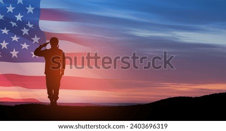Silhouette of soldier saluting on background of sunset or sunrise and USA flag. Greeting card for Veterans Day, Memorial Day, Independence Day. America celebration.