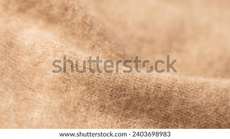 Beige luxury natural cashmere texture. Blurred background with copy space