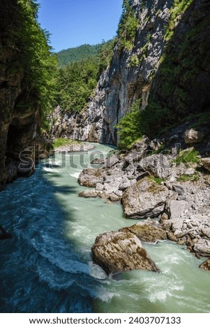 The beautiful canyon Aare Schlucht (Aareschlucht) - Part of the Aare river that runs through a limestone ridge near the city of Meiringen in Switzerland