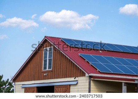 Solar panels on a Tennessee ranch Royalty-Free Stock Photo #2403717503