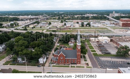 View of a historic church and buildings in downtown Topeka, Kansas, USA.