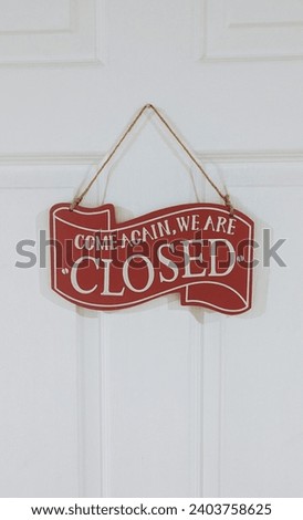 Closed hanging door sign.
(come again, we are Closed) door hanging sign