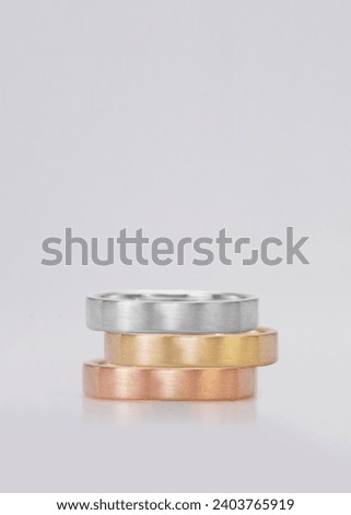 group stack  of band rings jewelry white gold - yellow gold - rose gold  Satin Texture 