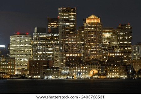 View of skyline of Boston at night, skyscrapers, front Boston Main Channel, Boston, Massachusetts, USA