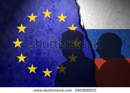 EU and Russia flags painted on the concrete wall. Viktor Orban and Hungary relations with Europe Union Royalty-Free Stock Photo #2403800055