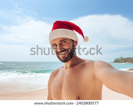 Selfie Photo of Bearded Beach Man with Thumb up of Christmas Holidays