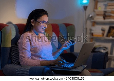 Shot of a young woman working from home