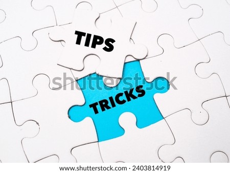 Tips, Tricks word alphabet letters on puzzle as a background