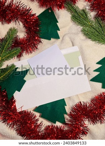 Letter envelope and New Year decorations on a white background