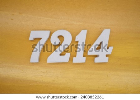 The golden yellow painted wood panel for the background, number 7214, is made from white painted wood.