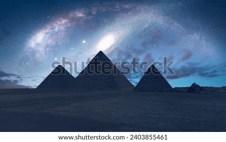 The Milky Way rises over the Pyramids in Giza Andromeda Galaxy in the background - Egypt  "Elements of this image furnished by NASA"