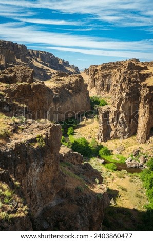 Jagged Rock Formations at Succor Creek State Natural Area, Oregon Royalty-Free Stock Photo #2403860477