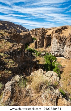 Jagged Rock Formations at Succor Creek State Natural Area, Oregon Royalty-Free Stock Photo #2403860481