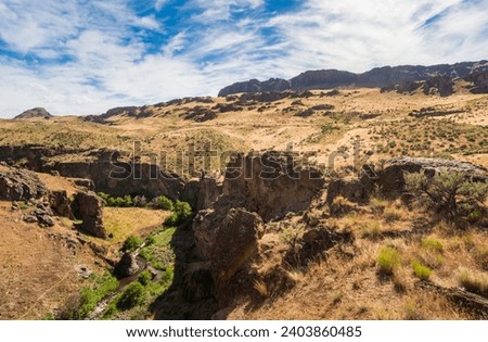 Jagged Rock Formations at Succor Creek State Natural Area, Oregon Royalty-Free Stock Photo #2403860485